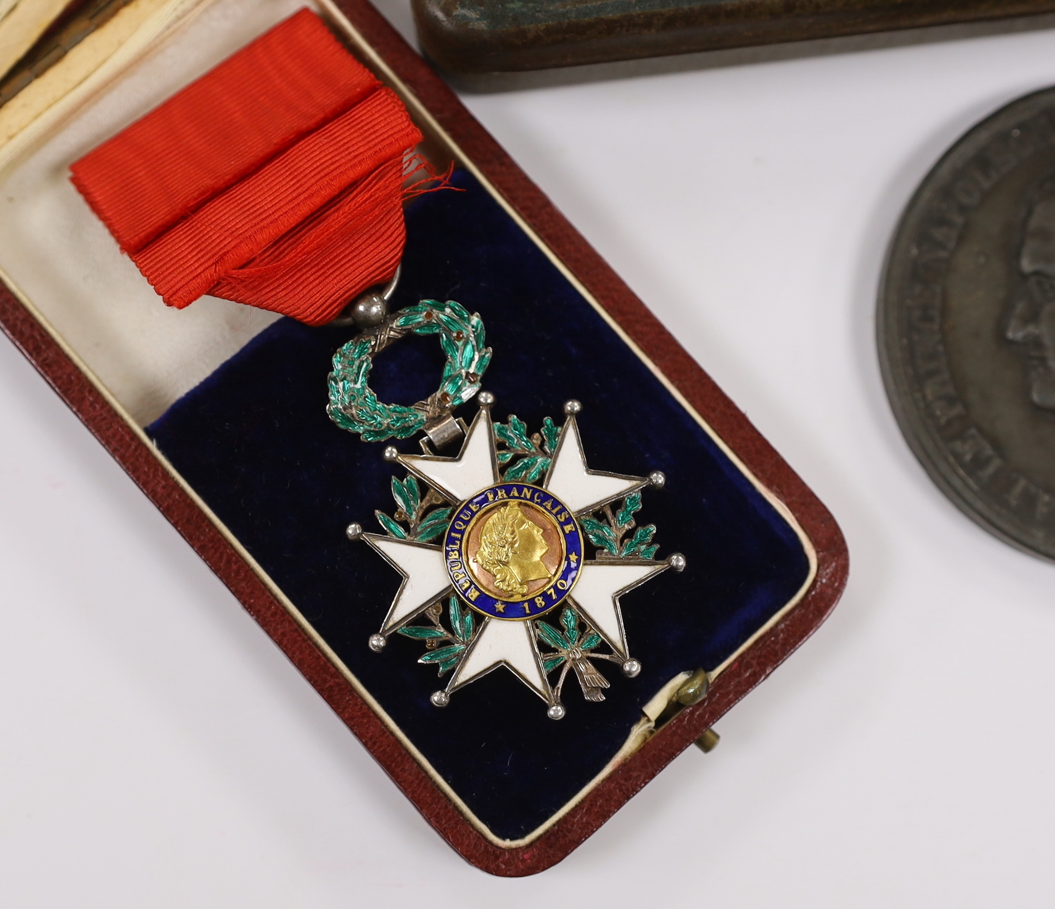A WWII medal group comprising The Burma Star, The 1939-1945 Star, The Defence medal and The War medal, a cased 1870 Republique Francaise medal, a Victoria Golden Jubilee medallion, an 1855 Napoleon medallion, a Polish Cr